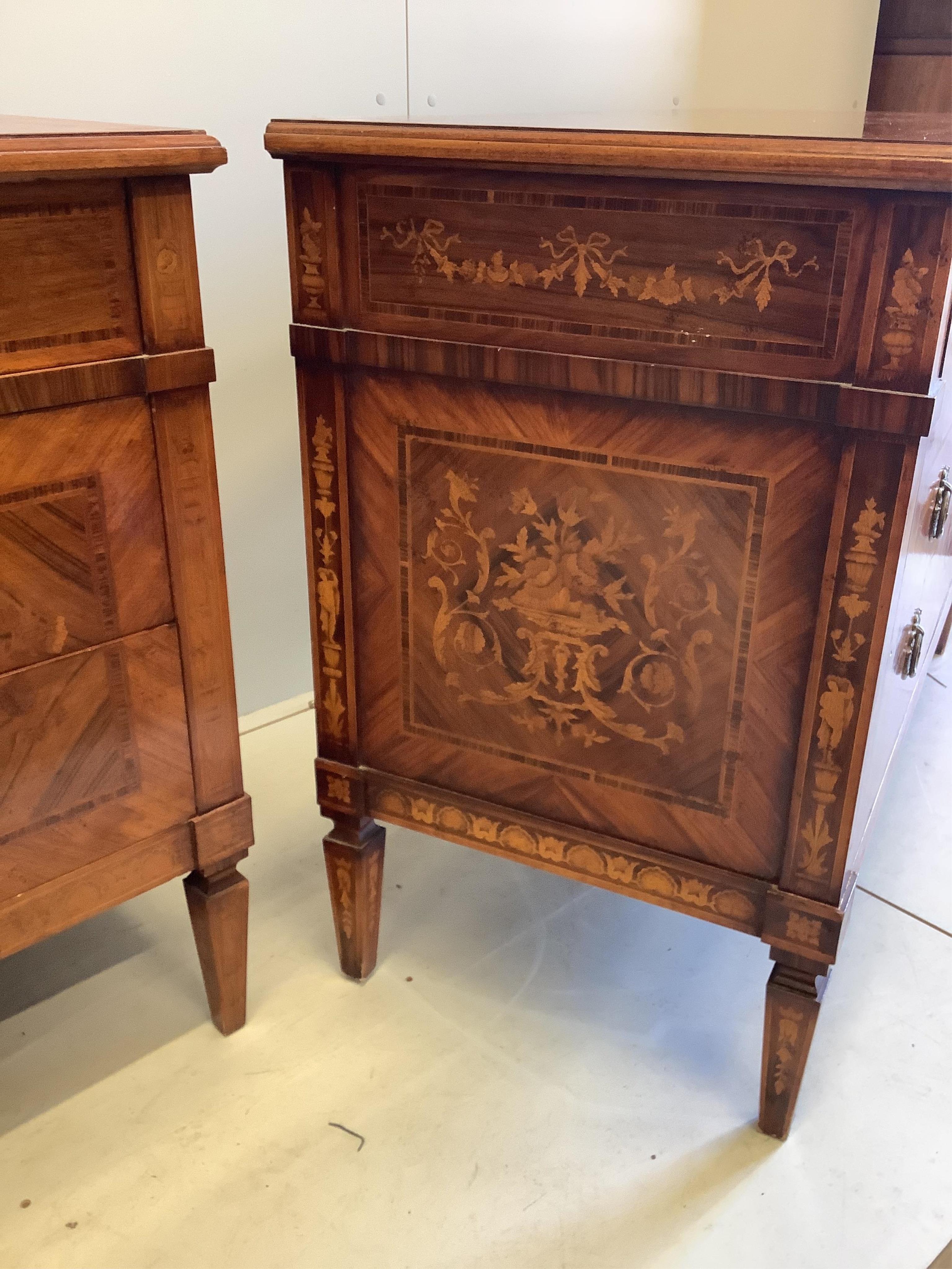 A pair of reproduction Milanese style marquetry inlaid kingwood commodes, width 128cm, depth 54cm, height 88cm. Condition - fair